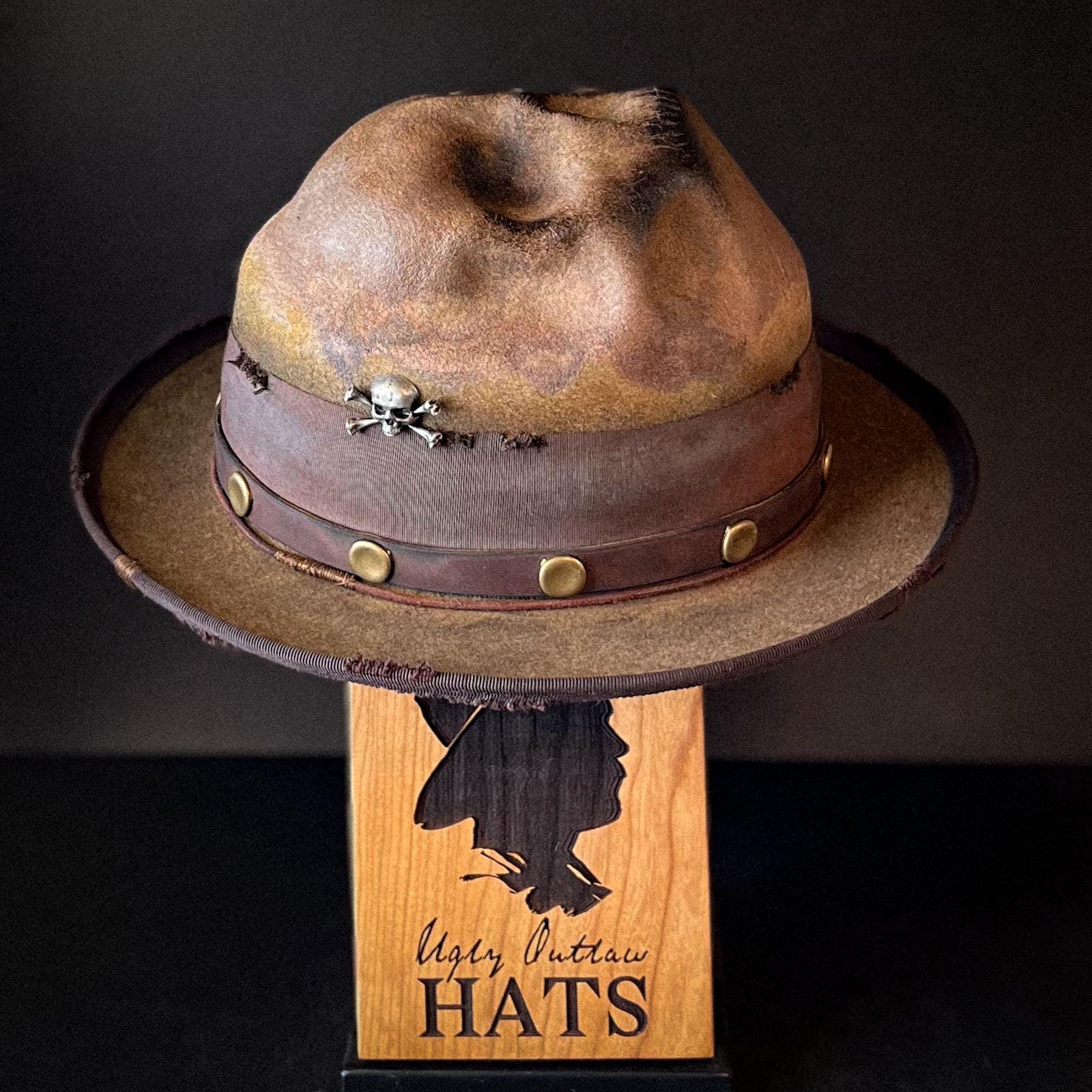 The “Skull of my Enemy” size 7 1/2 long oval from Ugly Outlaw Hats.