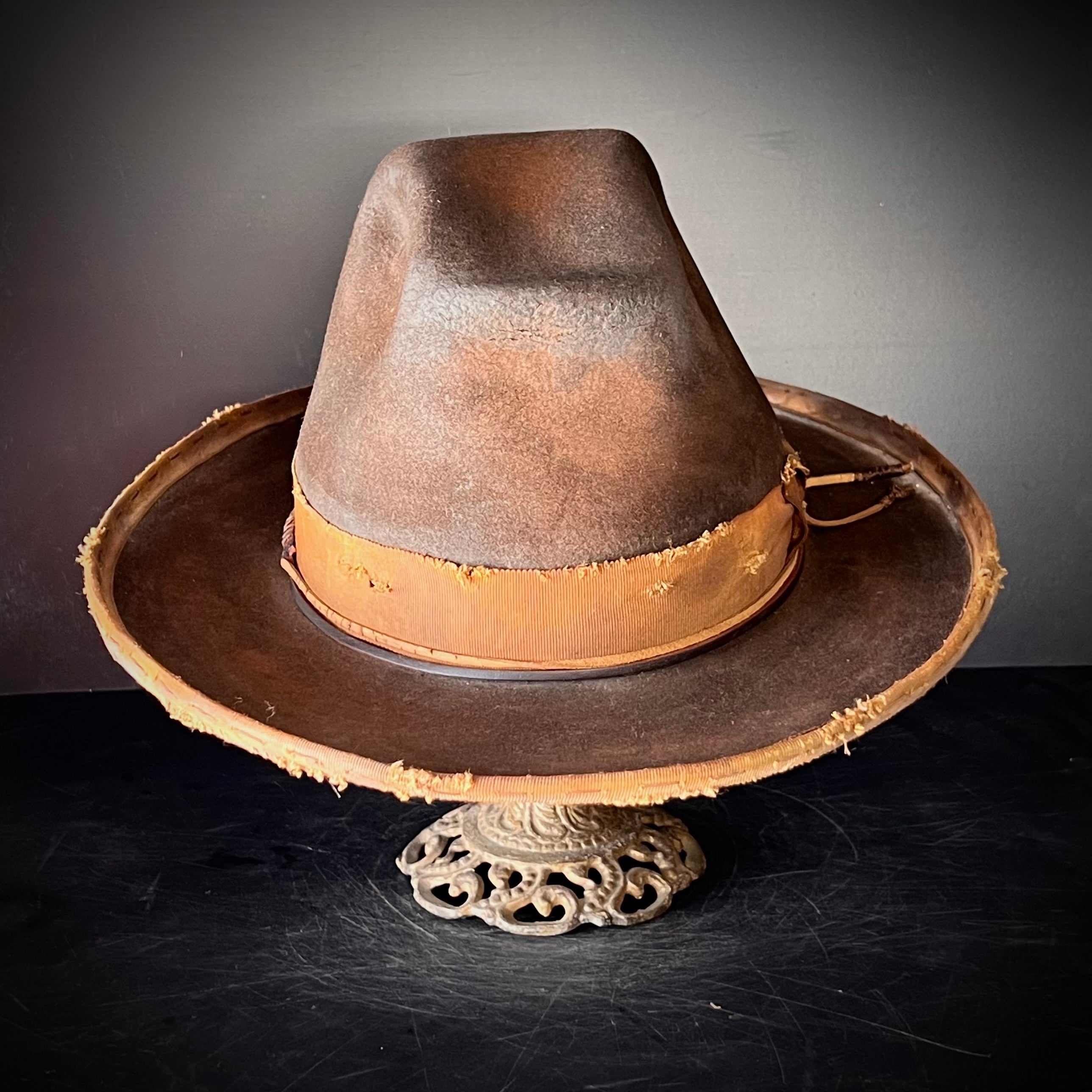 The “Pistol Packin’ Preacher” size 7 1/2 long oval.