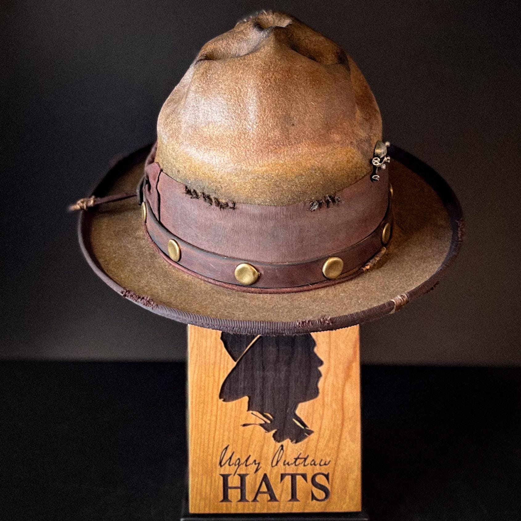 The “Skull of my Enemy” size 7 1/2 long oval from Ugly Outlaw Hats.