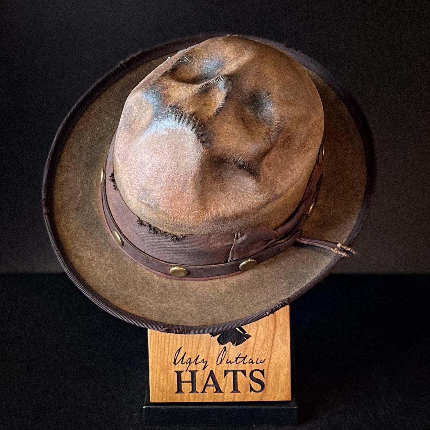 The “Skull of my Enemy” size 7 1/2 long oval from Ugly Outlaw Hats.