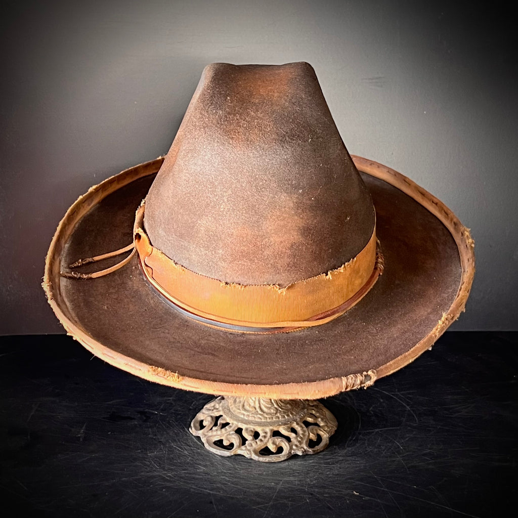 The “Pistol Packin’ Preacher” size 7 1/2 long oval.