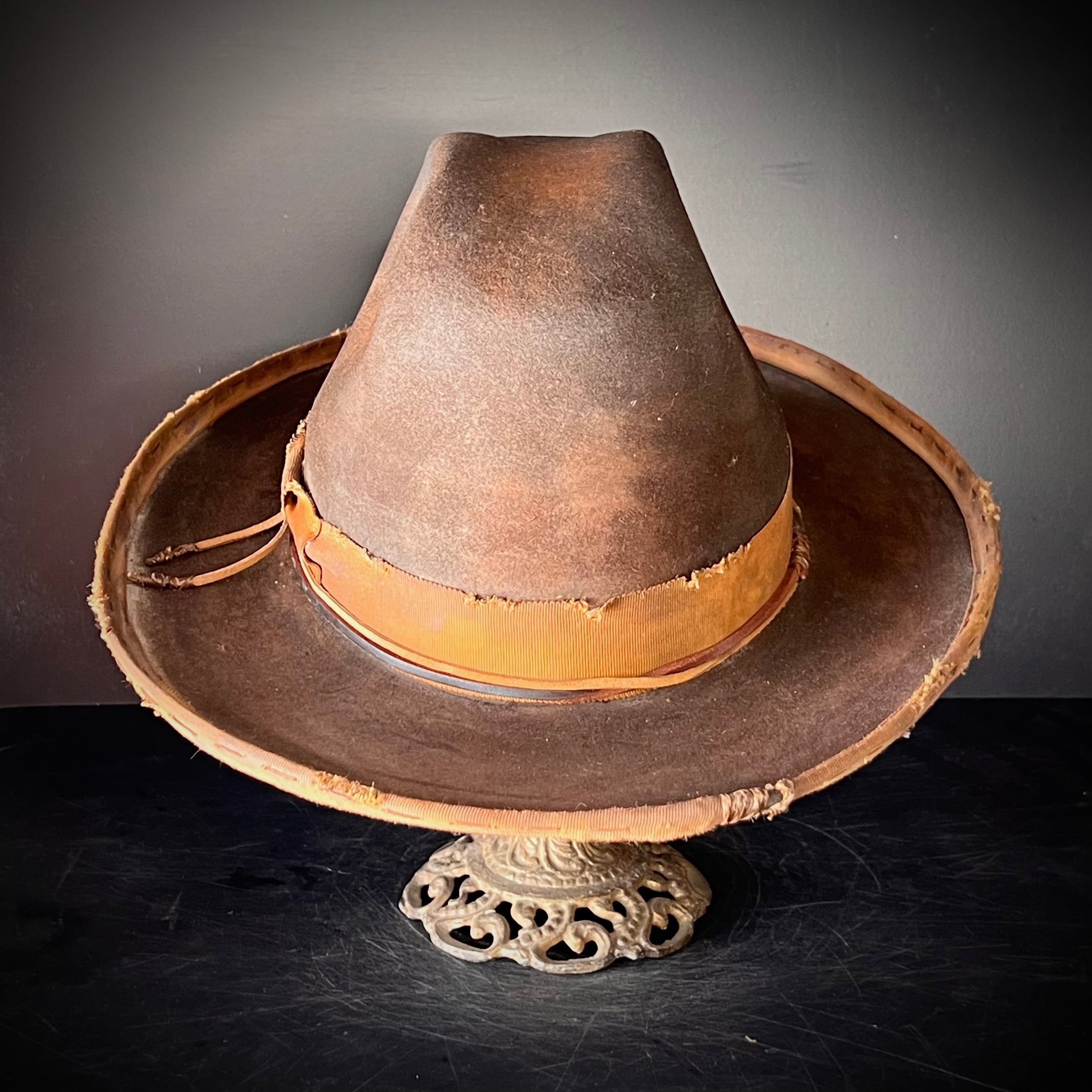 The “Pistol Packin’ Preacher” size 7 1/2 long oval.