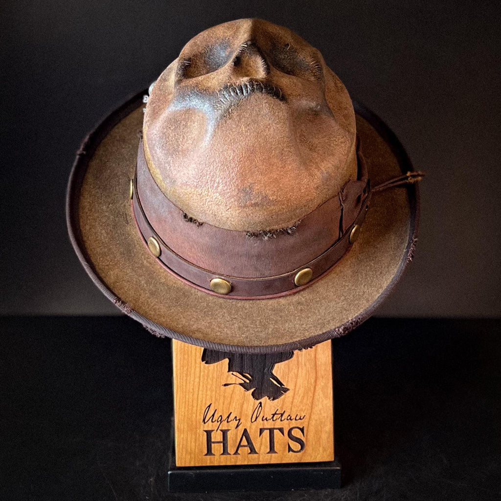 The “Skull of my Enemy” size 7 1/2 long oval from Ugly Outlaw Hats.
