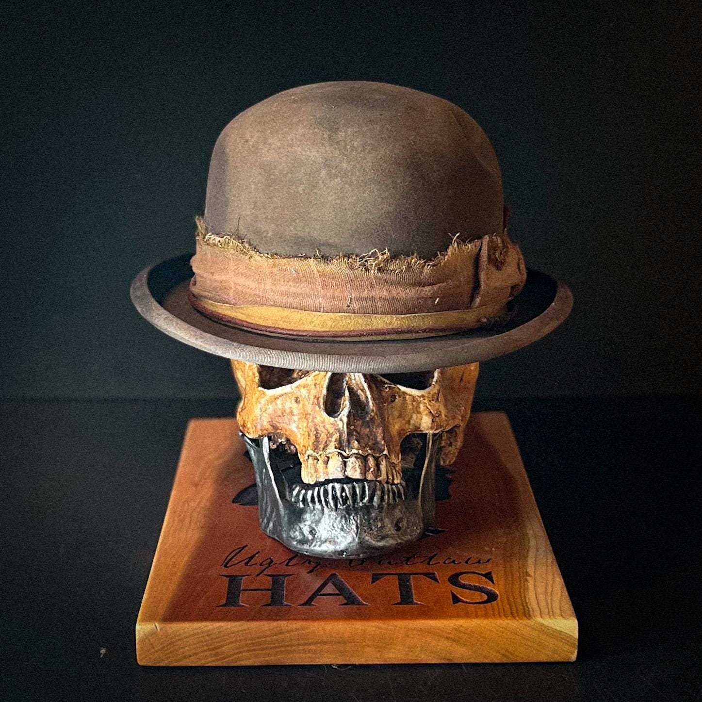 The “Man Who Chooses Violence” size 6 7/8 (55cm) from Ugly Outlaw Hats.